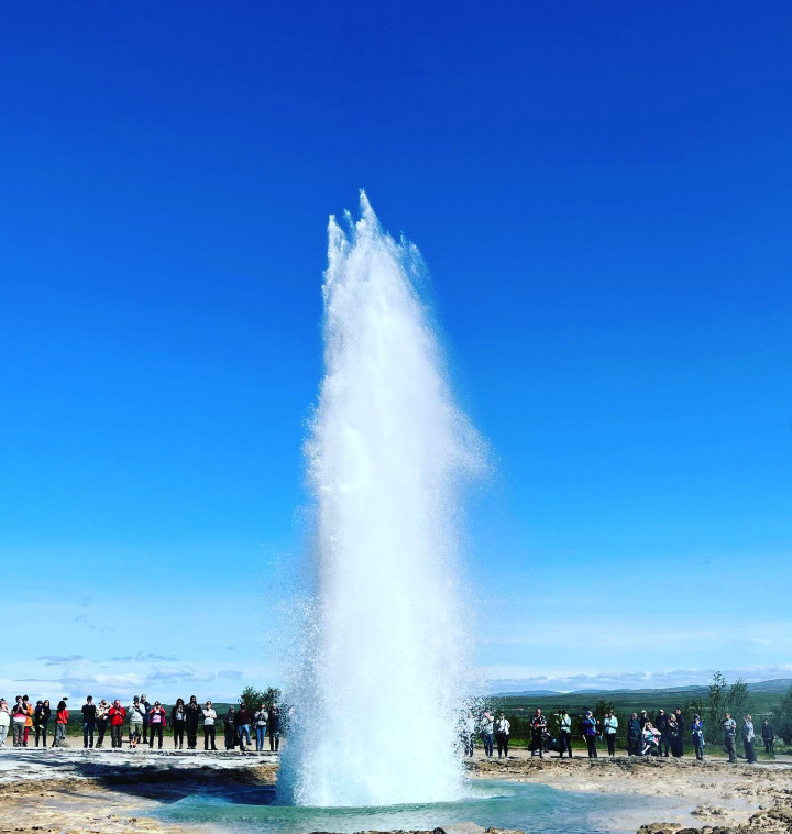 The Strokkur hot spring erupting at the Geysir area in Iceland
